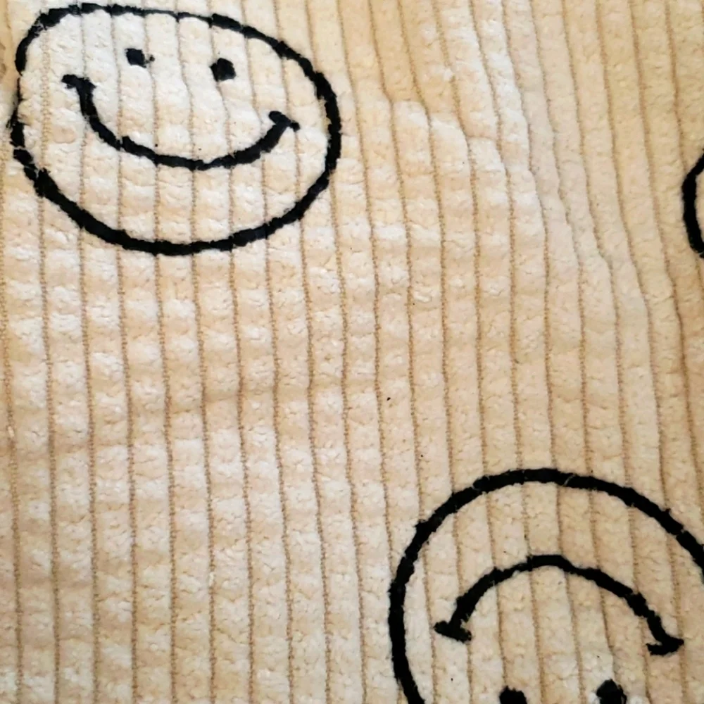 Lyanyan 2 Piece Makeup Bag Set in Beige Corduroy with a Black Smiley Face Print